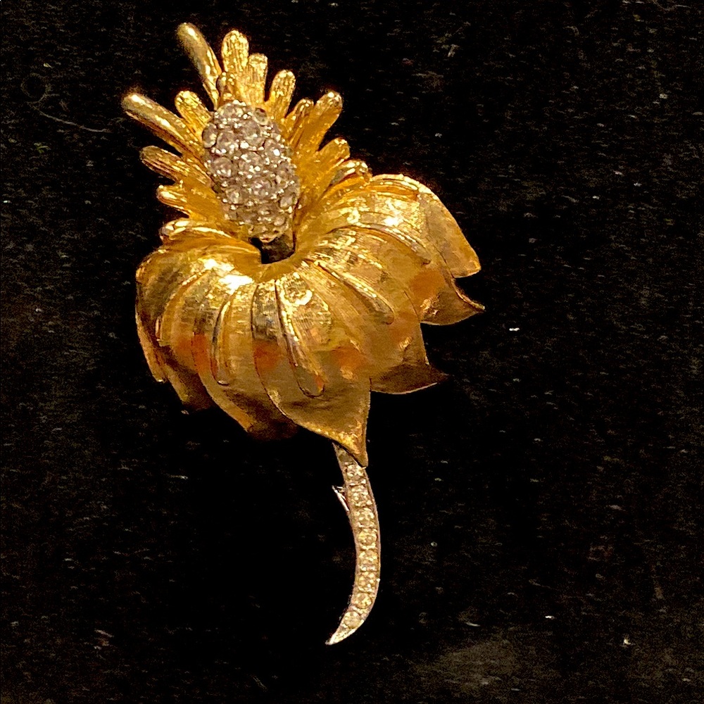 Arthur Pepper Gold Tone Domed Flower Brooch On A Stem with Clear Crystals.